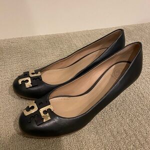 Dark navy blue Tory Burch round toe wedges.